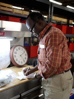 Robert Hamilton, 14th Logistics Readiness Squadron Material Management Flight hazardous material supervisor, reads hazardous material receipts March 19, 2019, on Columbus Air Force Base, Mississippi. The 14th LRS is the one-stop shop for all supplies and equipment at Columbus AFB. (U.S. Air Force photo by Airman Hannah Bean)