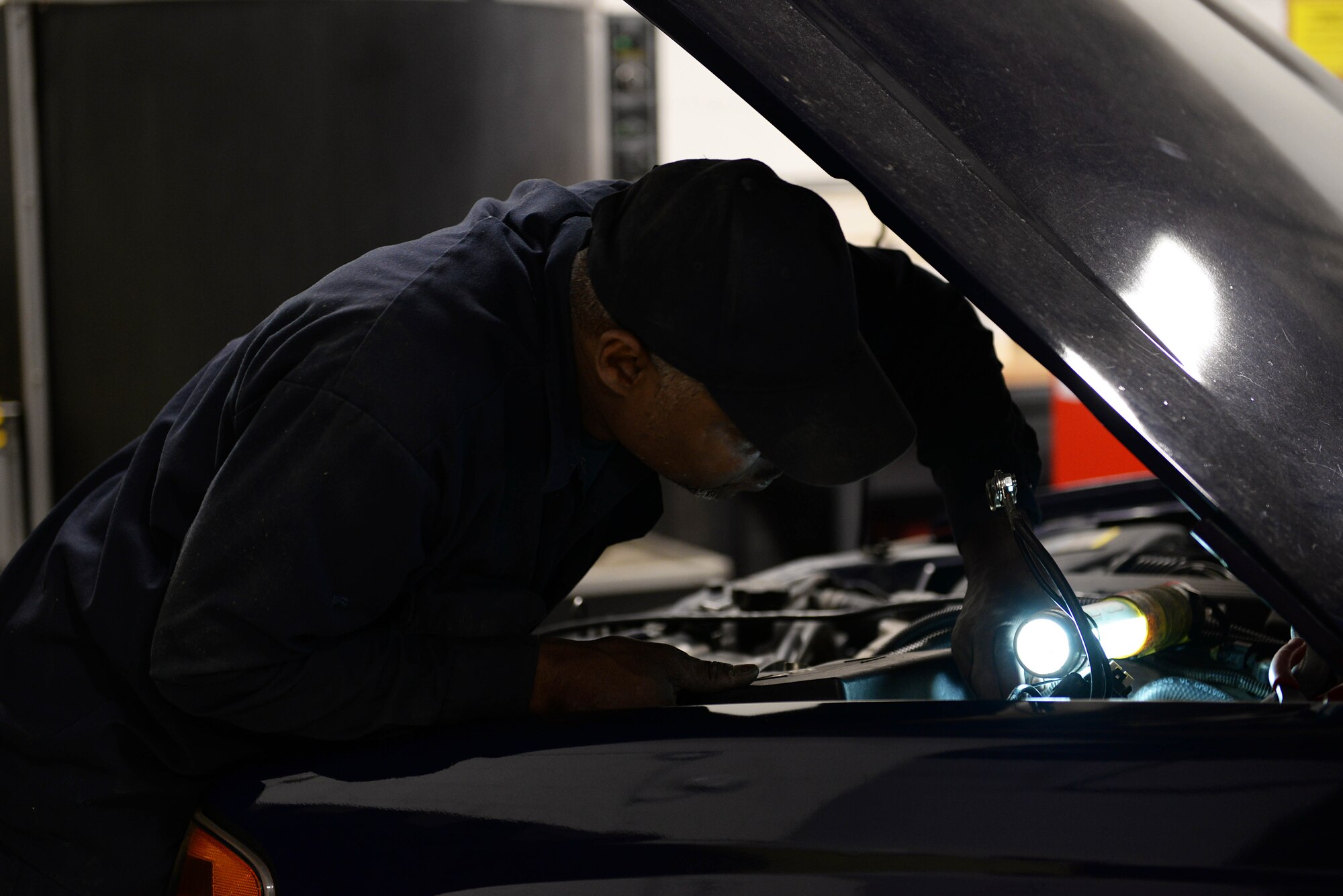Dewayne Chandler, 14th Logistics Readiness Squadron Transportation Flight heavy equipment mechanic, works on a government vehicle March 20, 2019, on Columbus Air Force Base, Mississippi. The Transportation Flight ensures government vehicles are well-maintained and ready for use. (U.S. Air Force photo by Airman Hannah Bean)