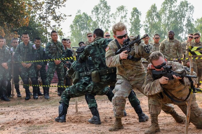 Soldiers from 5th Battalion-20th Infantry Regiment, 1st Stryker Brigade Combat Team, 2nd Infantry Division and the Royal Thai Army conduct the hall clearing phase of a combined military operations in urban terrain (MOUT) training at Cobra Gold 2019, Feb. 13, 2019, Phitsanulok, Kingdom of Thailand. Exercise Cobra Gold is the largest Theater Security Cooperation Exercise in the Indo-Pacific and is an integral part of the U.S. commitment to strengthen engagement in the region.