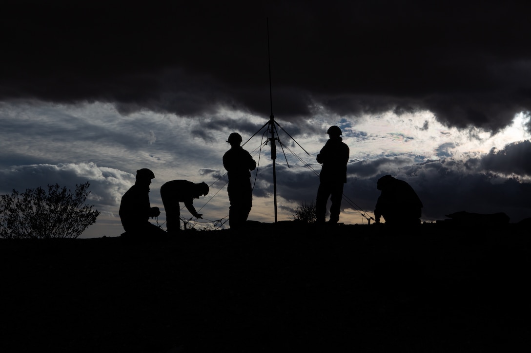 Japan Ground Self-Defense Force soldiers set up an antenna for the tactical operations center at the National Training Center, Fort Irwin, Calif., Feb. 15, 2019. Communication between the TOC and forward ground elements was essential for successful coordination of forces throughout the exercise. (U.S. Marine Corps photo by Lance Cpl. Andrew R. Bray)