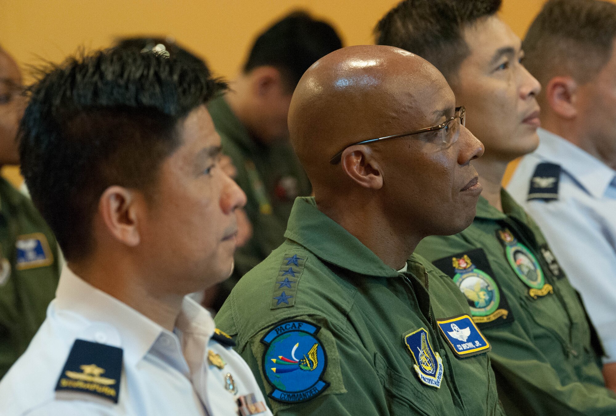 U.S. Air Force Gen. CQ Brown, Jr., Pacific Air Forces (PACAF) commander, receives a briefing during his visit to Changi Air Base, Singapore, March 19, 2019.