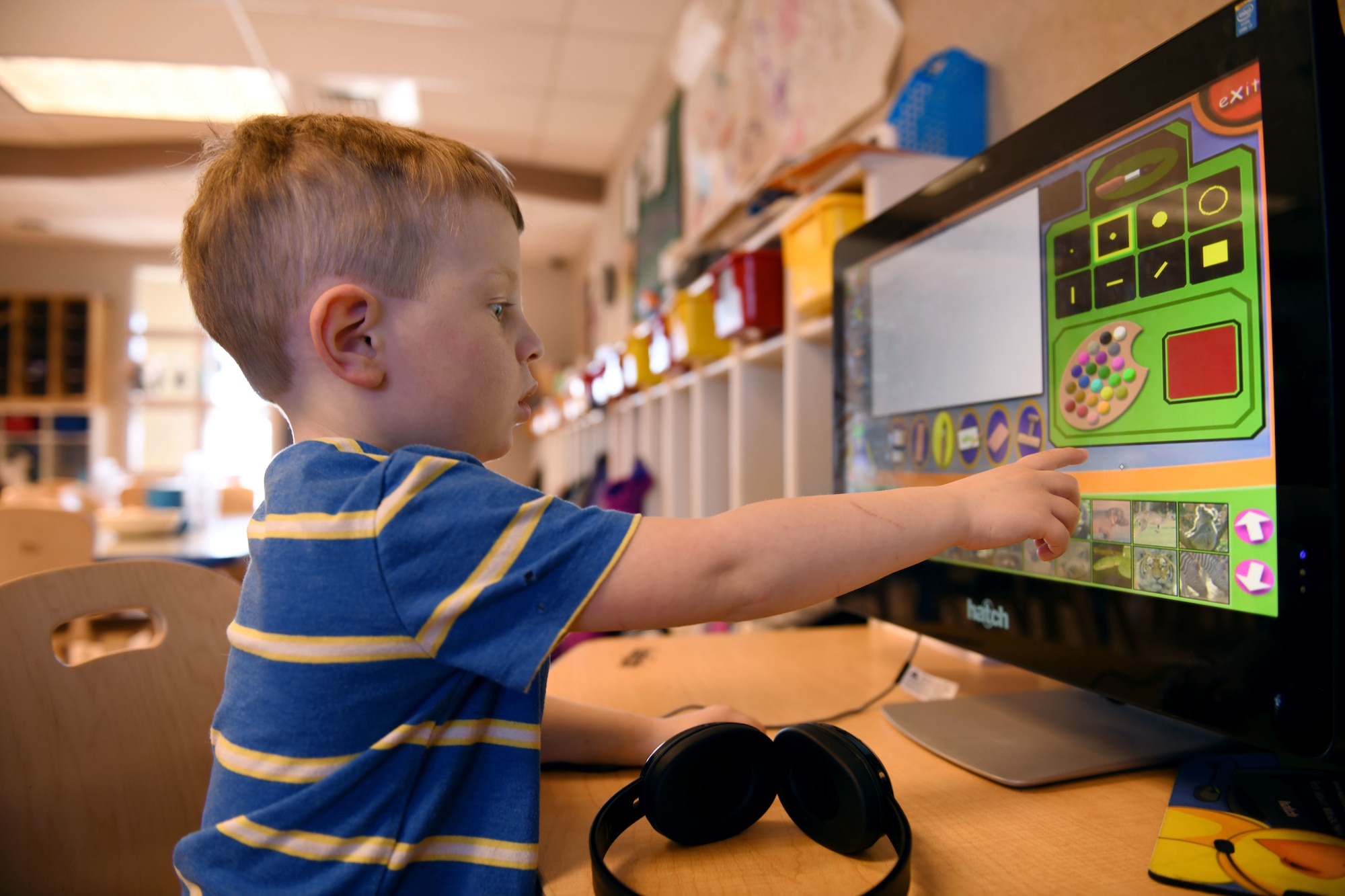 ylee Wilbur, son of Staff Sgts. Chaelynne and Brandon Wilbur, uses a Hatch Early Learning computer to learn his colors in room 135, at the McRaven Child Development Center on Ellsworth Air Force Base, S.D., March 19, 2019. The Early Learning Matters curriculum will be incorporated at all Department of Defense CDC’s in the coming months. Chaelynne is a 28th Maintenance Squadron crew chief and Brandon is a 28th Munitions Squadron crew chief.