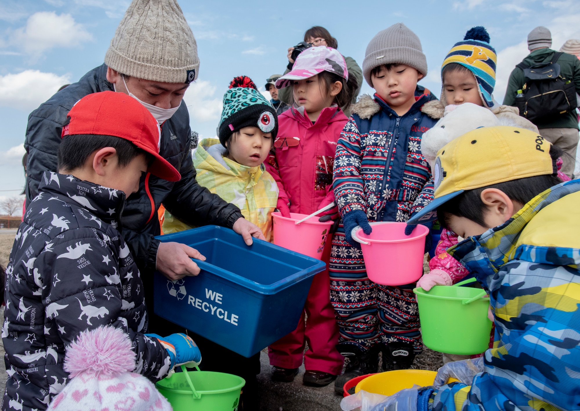 Japanese children wait for the start of the 22nd Annual Baby Salmon Release at Shimoda Salmon Park, Japan, March 16, 2019. The park conducts this bilateral event as part of Earth Day, encouraging awareness and appreciation for the environment.