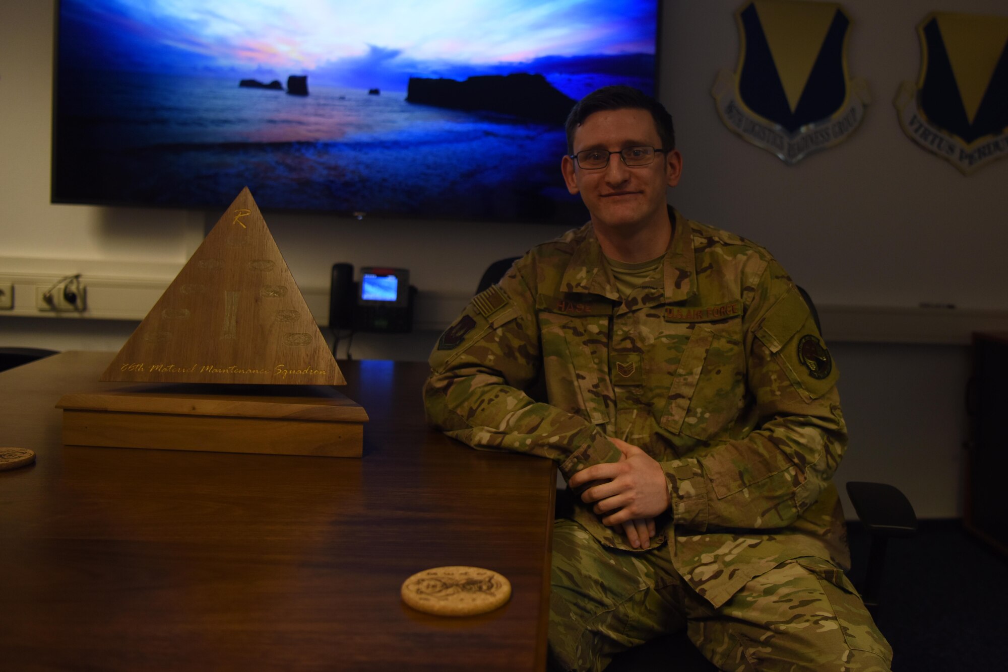 U.S. Air Force Staff Sgt. James Hase, 86th Materiel Maintenance Squadron war reserve materiel non commissioned officer in charge, poses for a photo during the Airlifter of the Week ceremony on Ramstein Air Base, Germany, March 21, 2019. Hase was honored by the 86th Airlift Wing command team for his outstanding accomplishments.