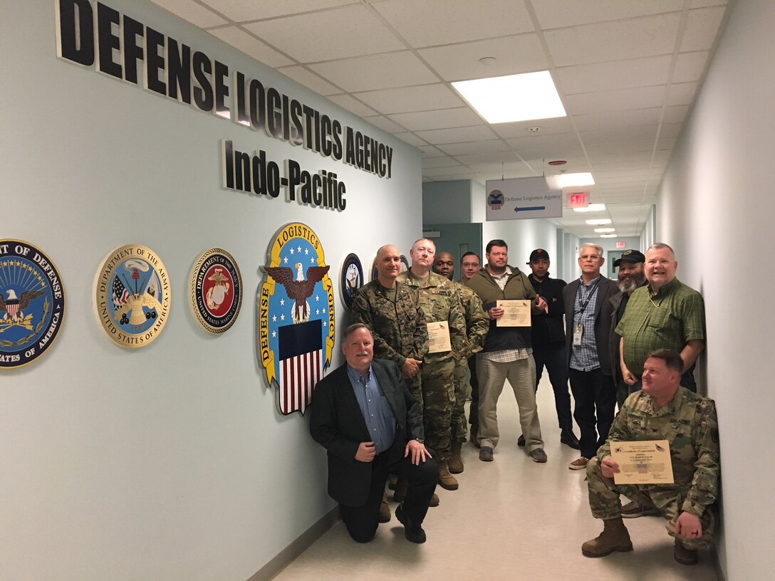 DLA Troop Support Indo-Pacific Korea Area Office employees pose after participating in a U.S. Forces Korea Command Post Exercise March 2019.