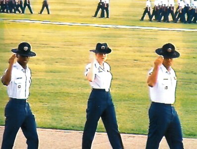 Then-Staff Sgt. Jennifer Martin, 97th Air Mobility Wing Staff Agency superintendent, marches in a basic training graduation ceremony as a Military Training Instructor, Oct. 4, 2002, at Joint Base San Antonio-Lackland.
