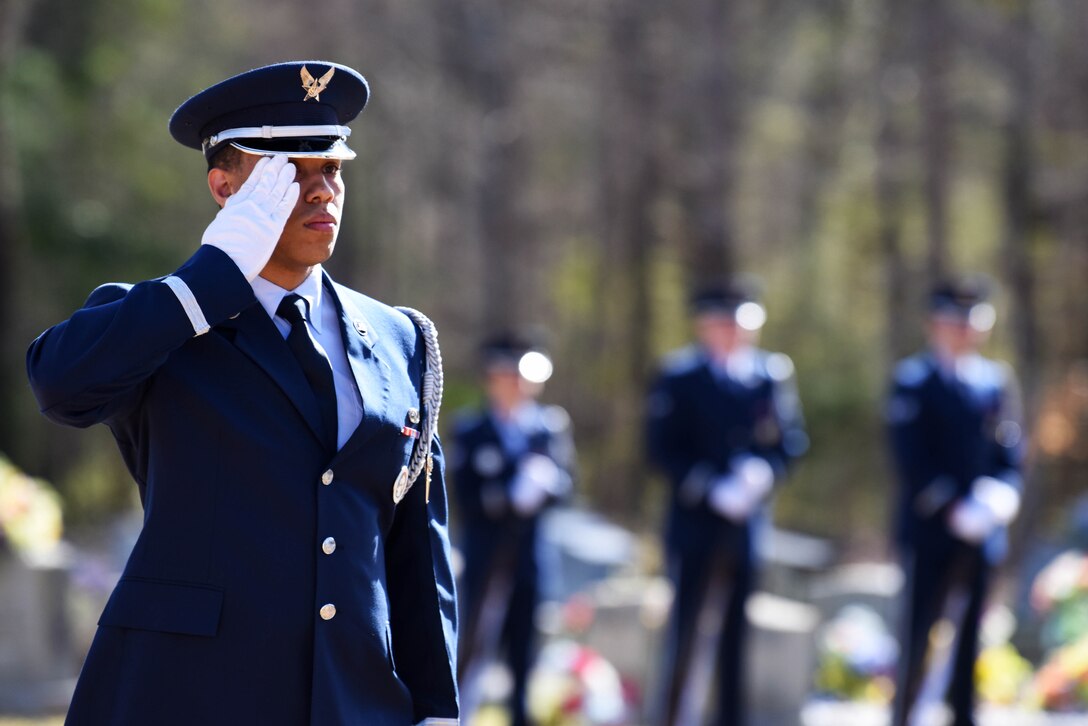 Senior Airman Sean Perry, a Columbus Air Force Base ceremonial guardsman, salutes John Cockerham’s, a local World War II veteran, casket March 16, 2019, Center Hill Baptist Church Cemetery in Hamilton, Mississippi. The Columbus Air Force Base Honor Guard’s main job is to provide the proper military honors to all fallen Airmen. (U.S. Air Force photo by Senior Airman Beaux Hebert)