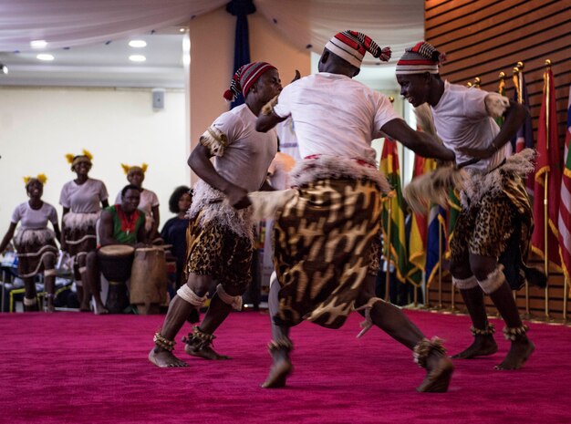 Members of the Nigerian Navy Cultural Dance Troupe perform a routine during the closing ceremony of exercise Obangame Express 2019.