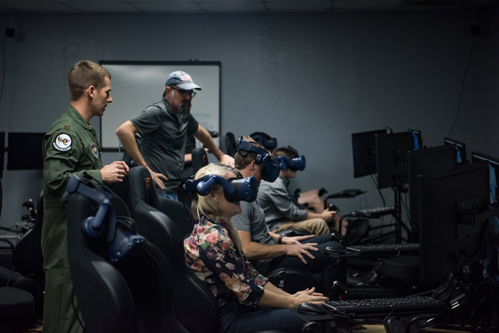 Members of the Leach family experiences a virtual reality trainer March 11, 2019, at the 559th Flying Training Squadron at Joint Base San Antonio-Randolph, Texas. The Leach family, based in Scottsdale, Ariz., spend much of their time traveling the country in “Ginger,” their RV. The video featuring their trip to JBSA-Randolph and their simulator experiences will be presented on the Season 7 premiere of their YouTube series, “Keep Your Daydream.