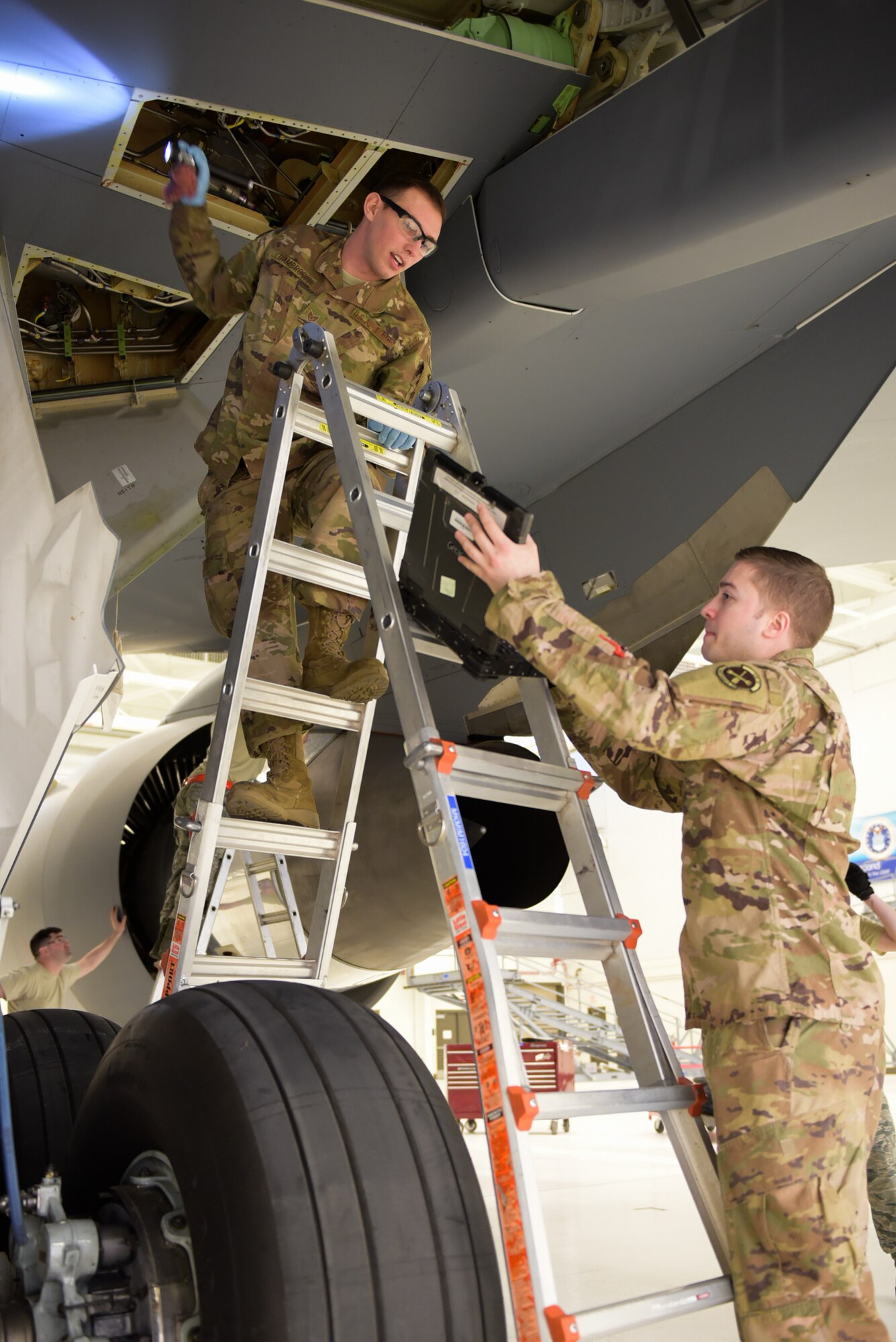 Staff Sgt. Ralph D’Ambrosio III, 22nd Aircraft Maintenance Squadron KC-46A Pegasus work manager, refers to a technical order March 20, 2019, at McConnell Air Force Base, Kan. New ideas, plans and processes are being created here at McConnell to help build the foundation for the KC-46 fleet that will spread throughout the Air Force. (U.S. Air Force photo by Staff Sgt. Chris Thornbury)