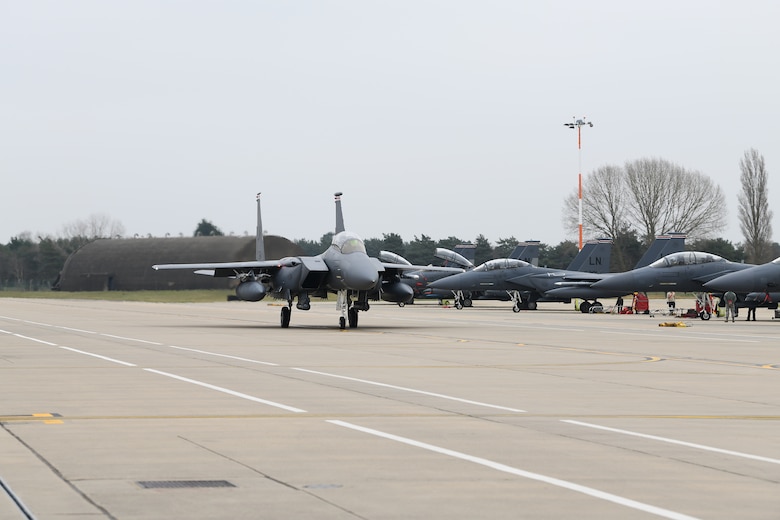 An F-15E Strike Eagle taxis on the flighline in preparation for exercise Pointblank at Royal Air Force Lakenheath, England, March 22, 2019. Point Blank is a recurring, low-cost exercise initiative designed to increase tactical proficiency of U.S. Air Forces in Europe – Air Forces Africa and Ministry of Defence forces. (U.S. Air Force photo by Airman 1st Class Shanice Williams-Jones)