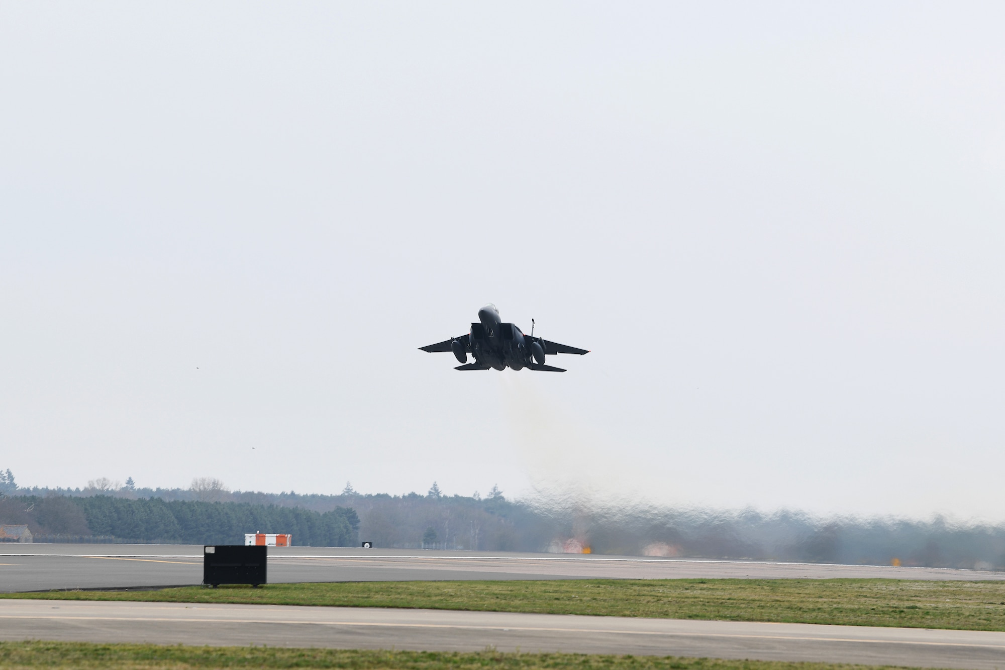 An F-15E Strike Eagle takes off to participate in exercice Point Blank at Royal Air Force Lakenheath, England, March 22, 2019. Point Blank is a recurring, low-cost exercise initiative designed to increase tactical proficiency of U.S. Air Forces in Europe – Air Forces Africa and Ministry of Defence forces. (U.S. Air Force photo by Airman 1st Class Shanice Williams-Jones)