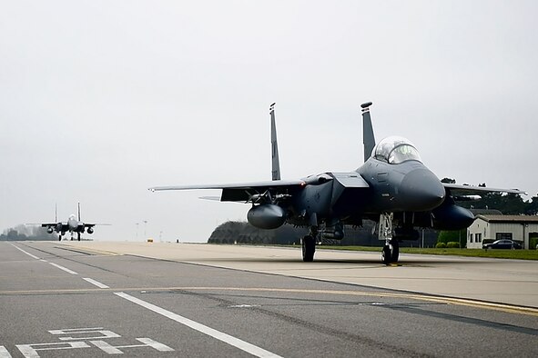 F-15E Strike Eagles taxi on the flightline at Royal Air Force Lakenheath, England, March 22, 2019. 492nd and  494th Fighter Squadrons joined Royal Air Force personnel and aircraft in the latest iteration of exercise Point Blank in Yorkshire, England. (U.S. Air Force photo by Airman 1st Class Shanice Williams-Jones)