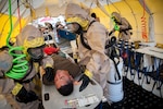 Hot-zone team members from Hawaii’s Chemical, Biological, Radiological, Nuclear, and High-Yield Explosive, Enhanced-Response-Force-Package Team (CERFP) process simulated casualties through a non-ambulatory decontamination zone during an evaluation exercise March 9, 2019, at Kalaeloa, Hawaii.
