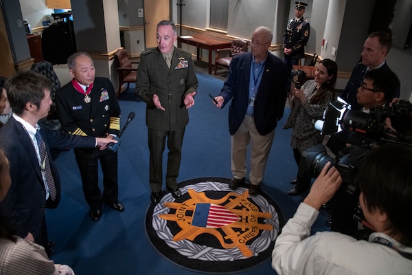 Marine Corps Gen. Joe Dunford, chairman of the Joint Chiefs of Staff, hosts a brief media availability following an Armed Forces full honor arrival ceremony for Japan Maritime Self - Defense Force Adm. Katsutoshi Kawano, chief of staff, Joint Staff, Japan Self-Defense Forces on Joint Base Myer-Henderson Hall, March 21, 2019