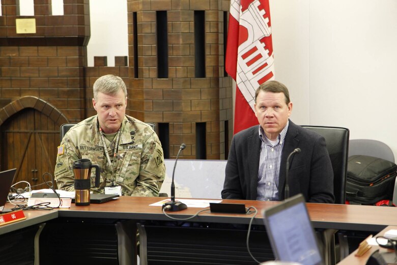 Col. Doug Guttormsen, Kansas City District commander, speaking with U.S. Rep. Sam Graves, MO-6th District, during a briefing on the current situation and flood risk reduction activities in Kansas City, Mo. March 22, 2019.