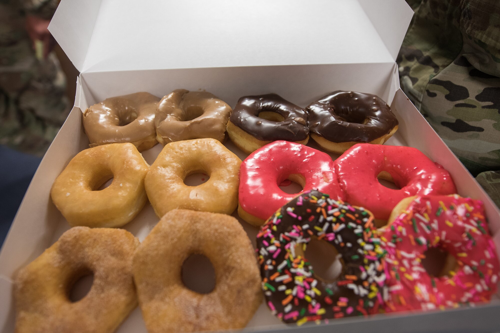 A dozen donuts await to be shared at the Diamonds and Donuts event at Cannon Air Force Base, N.M., March 22, 2019. Over 156 donuts were passed out to Air Commandos for the inaugural event to give Airmen a boost of morale. (U.S. Air Force photo by Airman 1st Class Vernon R. Walter III)
