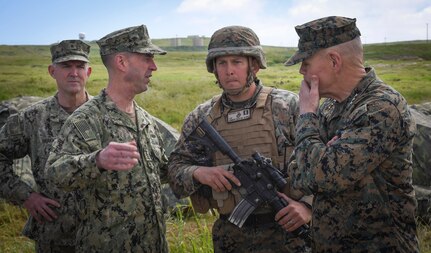 190319-N-YG104-0033 SAN CLEMENTE ISLAND, Calif. (March 19, 2019) Chief of Naval Operations (CNO) Adm. John Richardson (center) and Commandant of the Marine Corps Gen. Robert B. Neller and speak to Marines during Pacific Blitz 2019. Pacific Blitz provides relevant training that replicates a realistic maritime threat environment designed to improve naval amphibious core competencies necessary for effective, global crisis response expected of the Navy and Marine Corps. (U.S. Navy photo by Mass Communication Specialist 1st Class Sarah Villegas)
