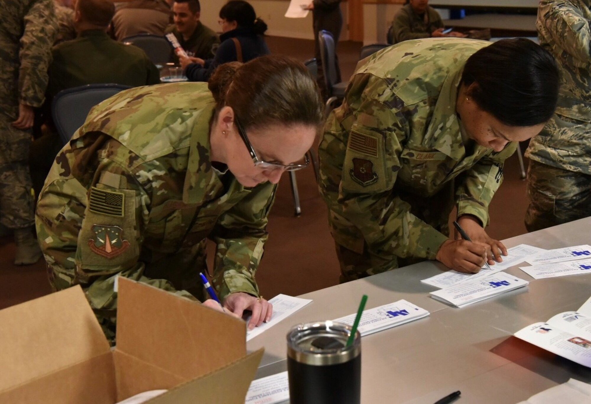 The Warren Spouses’ Club presents Col Stacy Jo Huser with a check of $6k to donate to the Air Force Assistance Fund at the kickoff breakfast March 22, 2019, at the Trail’s End Event Center on F.E. Warren Air Force Base, Wyo. This year’s goal is to have at least 20 percent of base members participate. (U.S. Air Force photo by Airman 1st Class Braydon Williams)