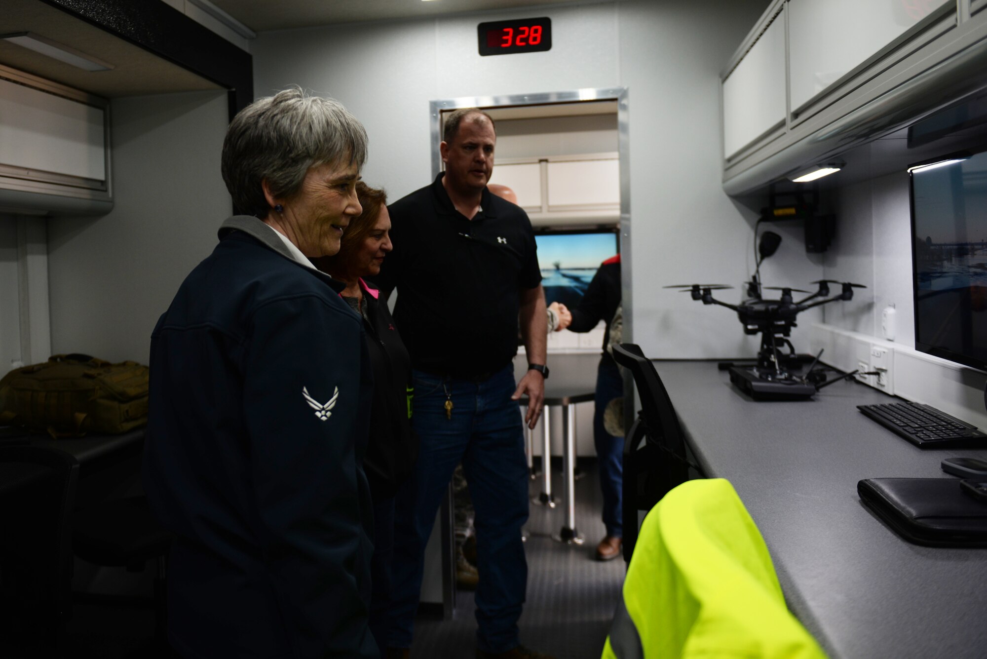 Secretary of the Air Force Heather Wilson tours the 55th Wing’s mobile Emergency Operations Center March 22, 2019, at Offutt Air Force Base, Nebraska. A week earlier the base began taking on flood waters that eventually covered one-third of the installation. (U.S. Air Force photo by Tech. Sgt. Rachelle Blake)