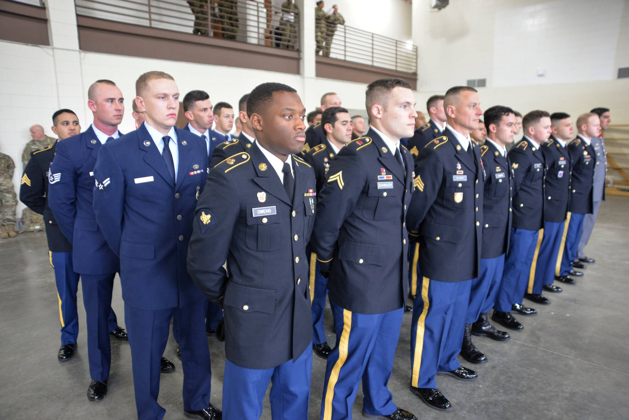 Competitors of the Texas National Guard’s 2019 Best Warrior Competition stand in formation before their first event of the competition at Camp Swift, Texas Feb. 27, 2019.  The four-day event will put the competitors through demanding physical and mental tests which include a physical fitness test, an obstacle course, marksmanship drills, formal board interviews and written exams. (Texas Air National Guard photo by Senior Airman Bryan Swink)