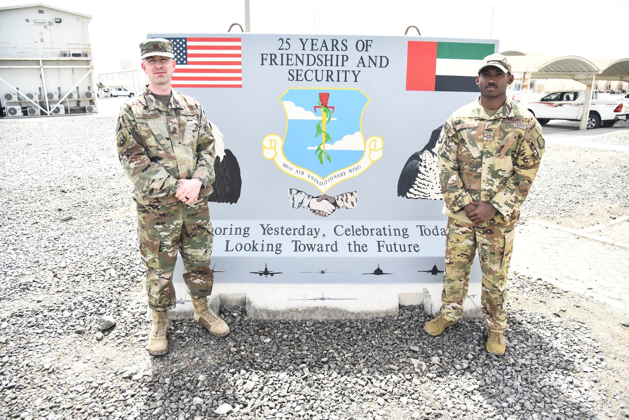 Maj. Vito Bussmann, 380th Air Expeditionary Wing chief of Plans and Programs, and Master Sgt. William Jackson, 380th AEW Plans and Programs superintendent, pose for a group photo at Al Dhafra Air Base, United Arab Emirates, Mar. 21, 2019. The 380th AEW plans and programs shop, also known as XP, manages 18 base plans that the wing maintains for various contingencies (Chemical, Biological, Radiological, Nuclear, and Explosive; mishap response; disease containment; etc.) and run the Operations Security, Mission Assurance and Signature Management programs. (U.S. Air Force photo by Senior Airman Mya M. Crosby)