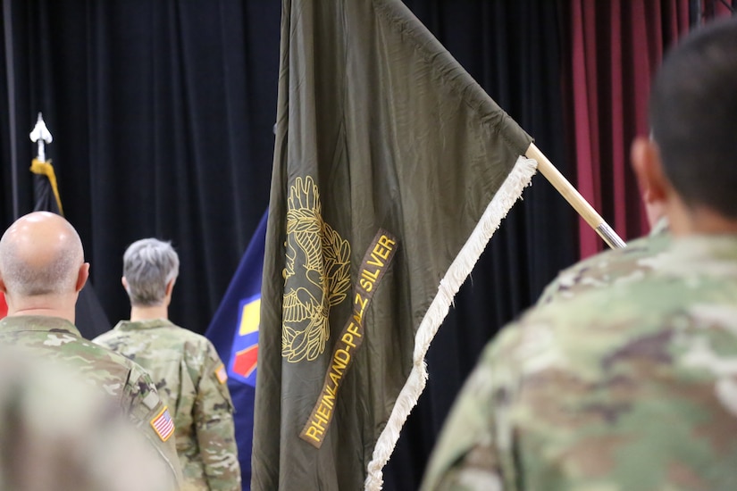 Chief Warrant Officer Five Martha Ervin relinquished responsibility to Chief Warrant Officer Five Vikki Hecht by the symbolic passing of the Warrant Officer Guidon during the Change of Responsibility ceremony March 23 at the Kaiserslautern Community Activity Center, Germany.