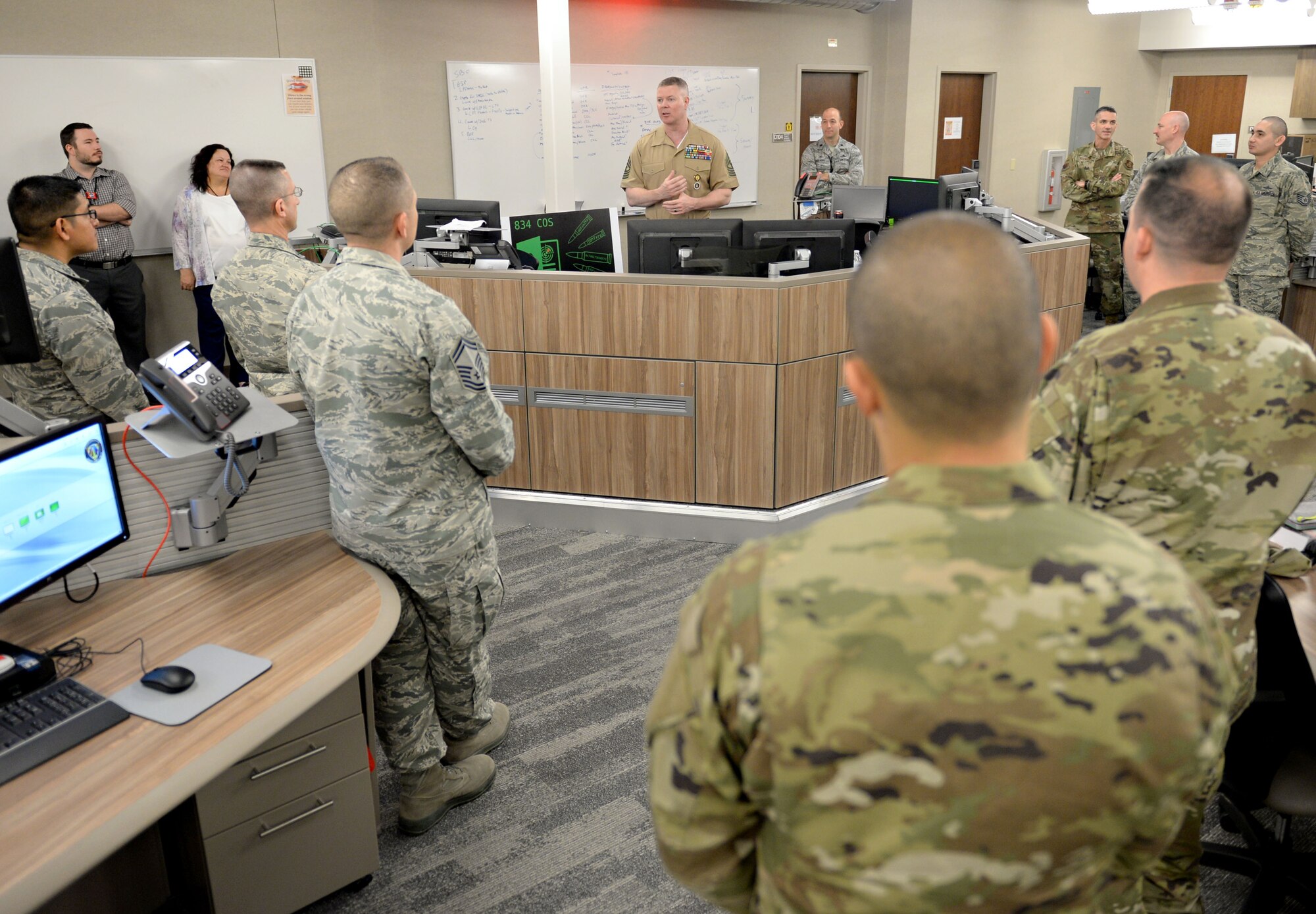Master Gunnery Sgt. Scott Stalker, U.S. Cyber Command and National Security Agency command senior enlisted leader, greets members of the 834th Cyberspace Operations Squadron at Joint Base San Antonio-Lackland, Texas, March 21, 2019. During his visit, Stalker met with cyber Airmen to learn more about their unit’s missions. (U.S. Air Force photo by Tech. Sgt. R.J. Biermann)