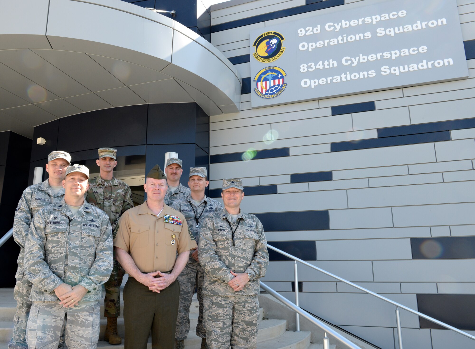 Master Gunnery Sgt. Scott Stalker, U.S. Cyber Command and National Security Agency command senior enlisted leader (center), along with 92nd and 834th Cyberspace Operations Squadron leaders pose for a photo at Joint Base San Antonio-Lackland, Texas, March 21, 2019. During his visit, Stalker met with cyber Airmen and learned more about their unit’s missions. (U.S. Air Force photo by Tech. Sgt. R.J. Biermann)