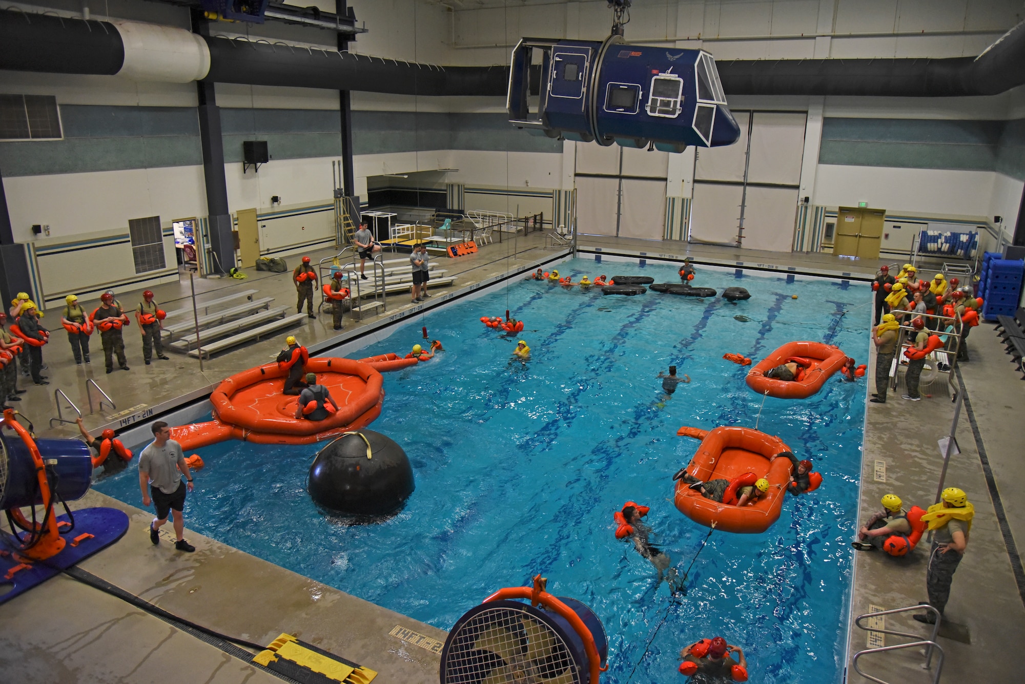 Survival, Evasion, Resistance and Escape specialists assigned to the 336th Training Group conduct water survival training with a class of 43 aircrew members at Fairchild Air Force Base, Washington, March 21, 2019. The primary focus of water survival training is to prepare aircrew members for emergency aircraft situations and surviving on the ocean until they can be rescued and recovered. (U.S. Air Force photo by Staff Sgt. Mackenzie Mendez)