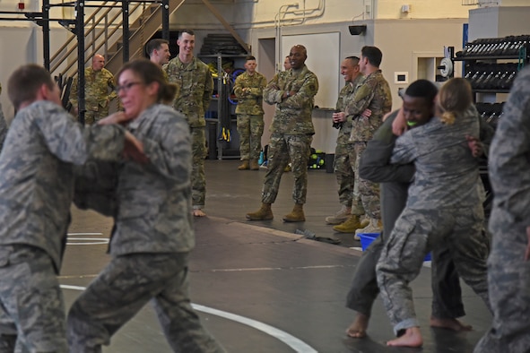 Chief Master Sgt. of the Air Force Kaleth O. Wright watches as 22nd Training Squadron Survival, Evasion, Resistance and Escape specialists conduct apprehension avoidance and combatives training at Fairchild Air Force Base, Washington, March 21, 2019.  During Wright’s visit, he learned the ins-and-outs of becoming a SERE specialist and the different methods of training conducted around the Inland Northwest. (U.S. Air Force photo by Staff Sgt. Mackenzie Mendez)