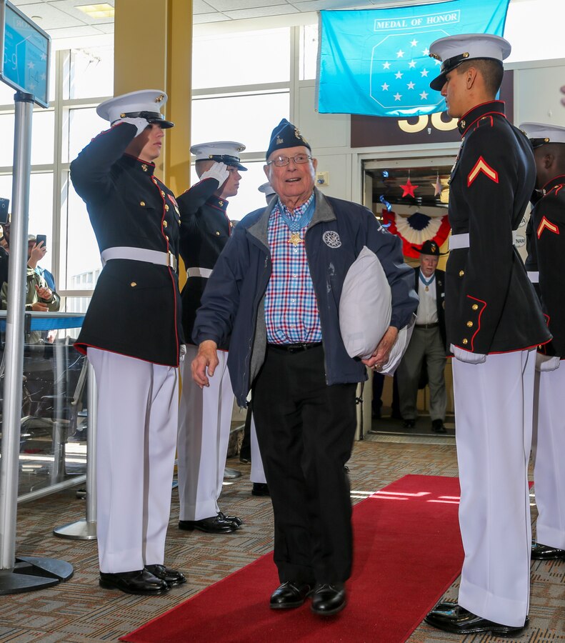 Marines with Alpha Company, Marine Barracks Washington D.C., support the annual Medal of Honor (MoH), Honor Flight at Ronald Reagan National Airport, Washington, D.C., March 23, 2019. The 30 MoH recipients were welcomed by the Marines upon their arrival, among a military band, numerous volunteers, and people eager to shake their hands. The honor flight aims to pay tribute to those who served their country during times of war and received our nation’s highest and most prestigious personal military decoration; the Medal of Honor. (U.S. Marine Corps photo by Sgt. Robert Knapp/Released)