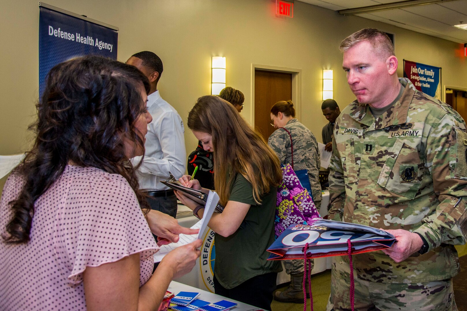 Hundreds of job seekers visited, explored career options with and handed out resumes to Department of Defense employers at the Hiring Heroes Career Fair held in the Sam Houston Community Center at Joint Base San Antonio-Fort Sam Houston March 20.
