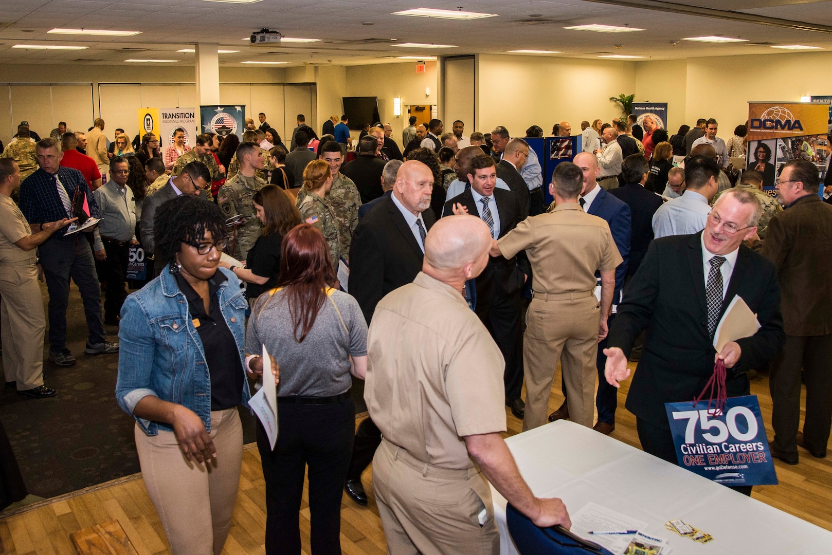 Hundreds of job seekers visited, explored career options with and handed out resumes to Department of Defense employers at the Hiring Heroes Career Fair held in the Sam Houston Community Center at Joint Base San Antonio-Fort Sam Houston March 20.