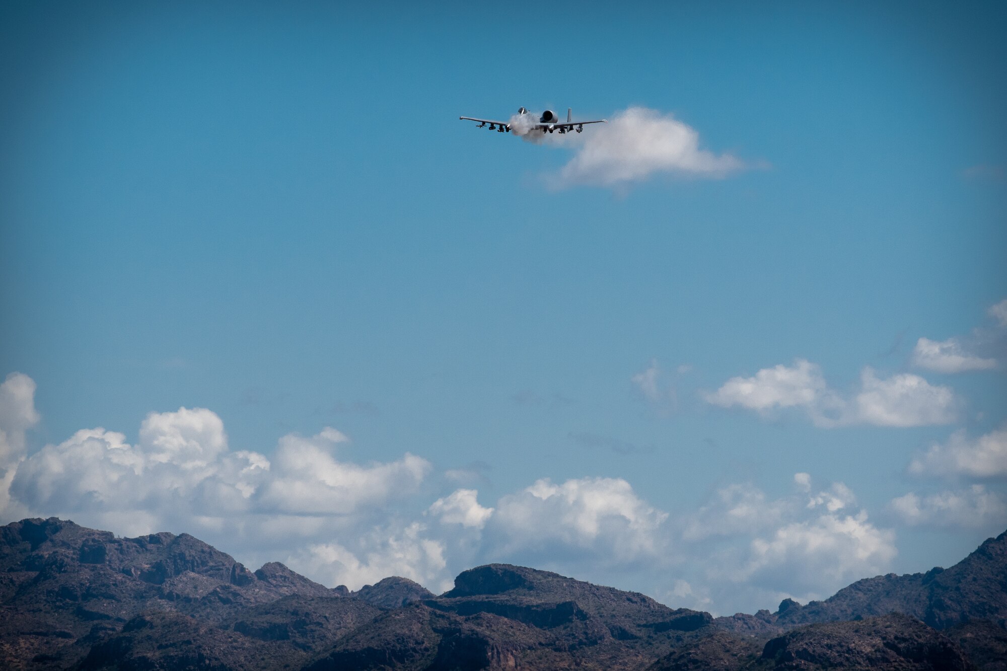 An A-10 Thunderbolt II, assigned to Davis-Monthan Air Force Base, Ariz. conducts a low-level strafing pass March 13, 2019, at the Barry M. Goldwater Range near Gila Bend, Ariz.