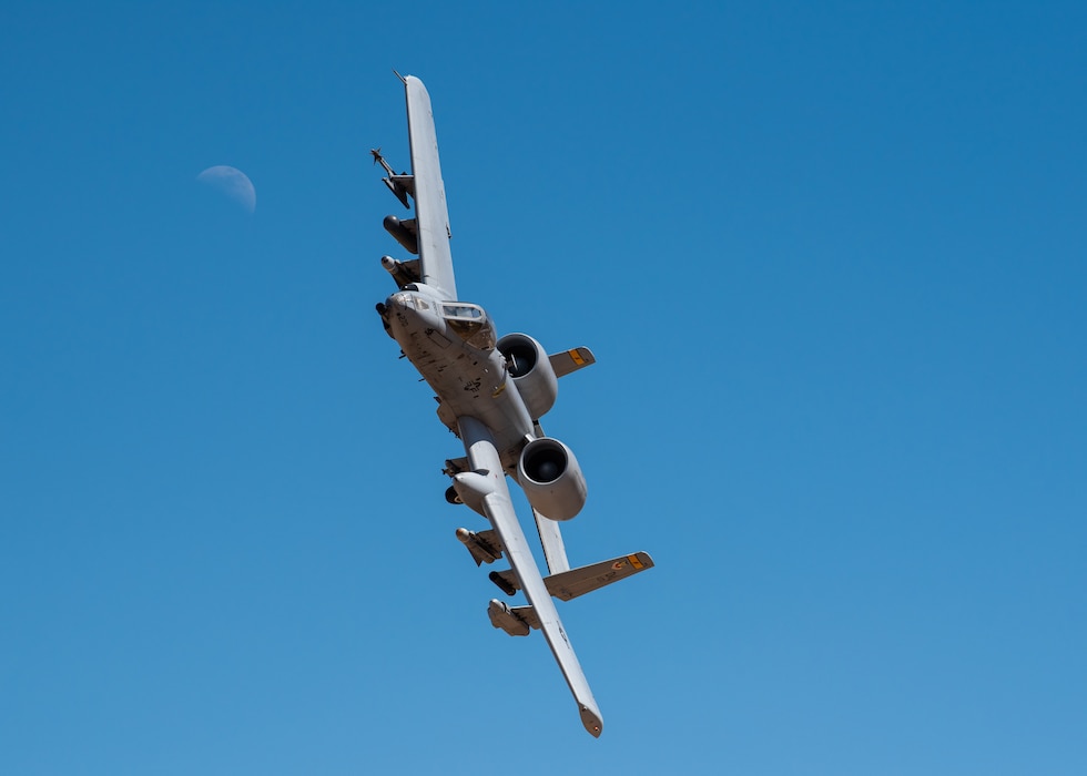 An A-10 Thunderbolt II, assigned to Davis-Monthan Air Force Base, Ariz. performs a panel check over the control tower, March 13, 2019 at the 1.7 million acre Barry M. Goldwater Range near Gila Bend, Ariz.