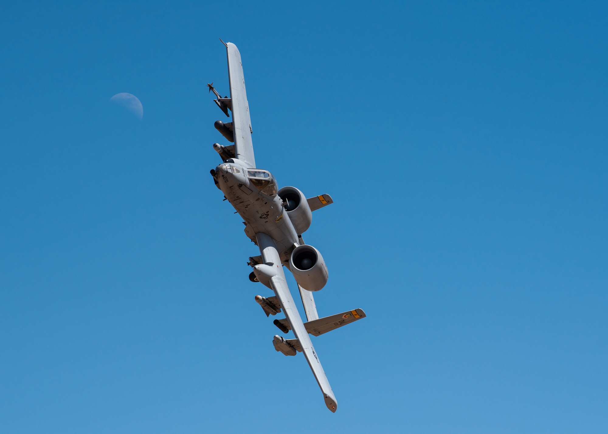 An A-10 Thunderbolt II, assigned to Davis-Monthan Air Force Base, Ariz. performs a panel check over the control tower, March 13, 2019 at the 1.7 million acre Barry M. Goldwater Range near Gila Bend, Ariz.