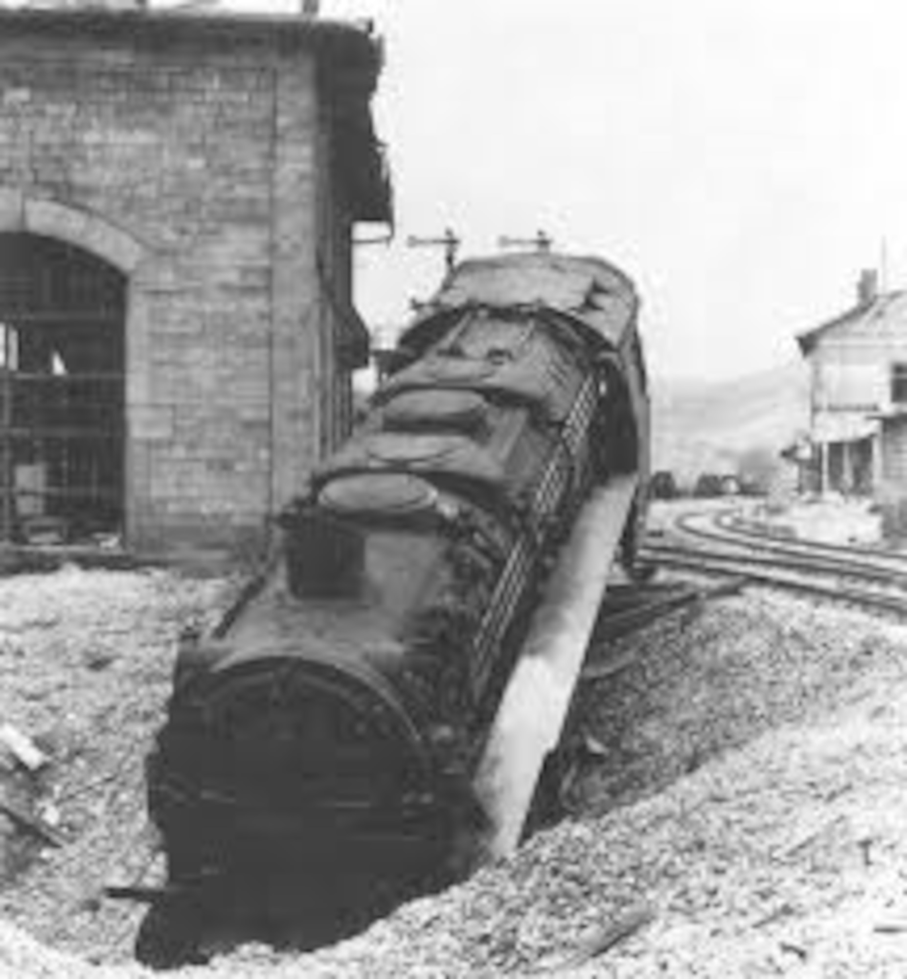 A French locomotive knocked off the tracks at a French rail center after an aerial attack. During the conduct of the Transportation Plan, Allied planners discovered that the German authorities could relatively replace destroyed and damaged freight cars by transferring freight cars from Germany and further east to France. However, destroyed or heavily damaged locomotives were not as easily replaced as the freight cars. (USAAF archival photo)