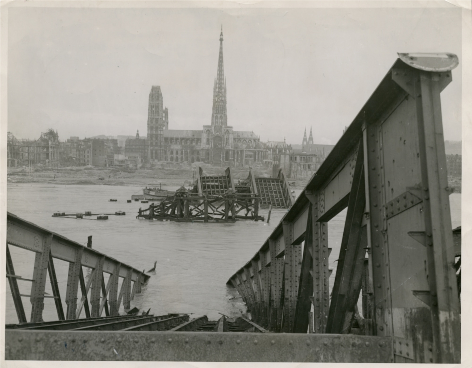 Allied air attack on the cathedral city of Rouen, France on July 9, 1944, destroyed much of the city, including the major bridges, like this one, over the Seine River. (USAAF archival photo)