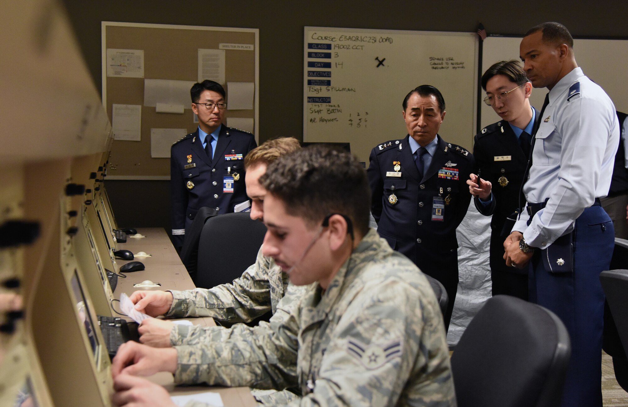 U.S. Air Force Lt. Col. Billy Wilson, 334th Training Squadron commander, shows Republic of Korea Air Force Maj. Gen. Geunyoung Choi, ROKAF Air Education and Training Command commander, a classroom in his squadron during their visit to Keesler Air Force Base, Mississippi, March 22, 2019. Choi visited Keesler to help better develop ROKAF technical education through visiting U.S. Air Force future technology education sites.  (U.S. Air Force photo by Kemberly Groue)
