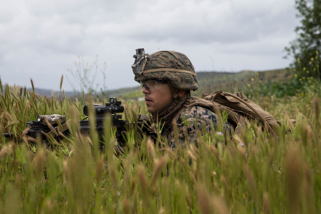 U.S. Marine Corps Pfc. Aaron Rivera, a rifleman with 2nd Battalion, 4th Marine Regiment, 1st Marine Division, provides security during the Infantry Integration with Counterintelligence/Human Intelligence Operations at Marine Corps Base Camp Pendleton, California, March 21, 2019. TACEX 19.2 is an exercise for infantry and CI/HUMINT to tailor patrols for both units to effectively locate and sustain possible threats in order to properly train participants for combat deployments.