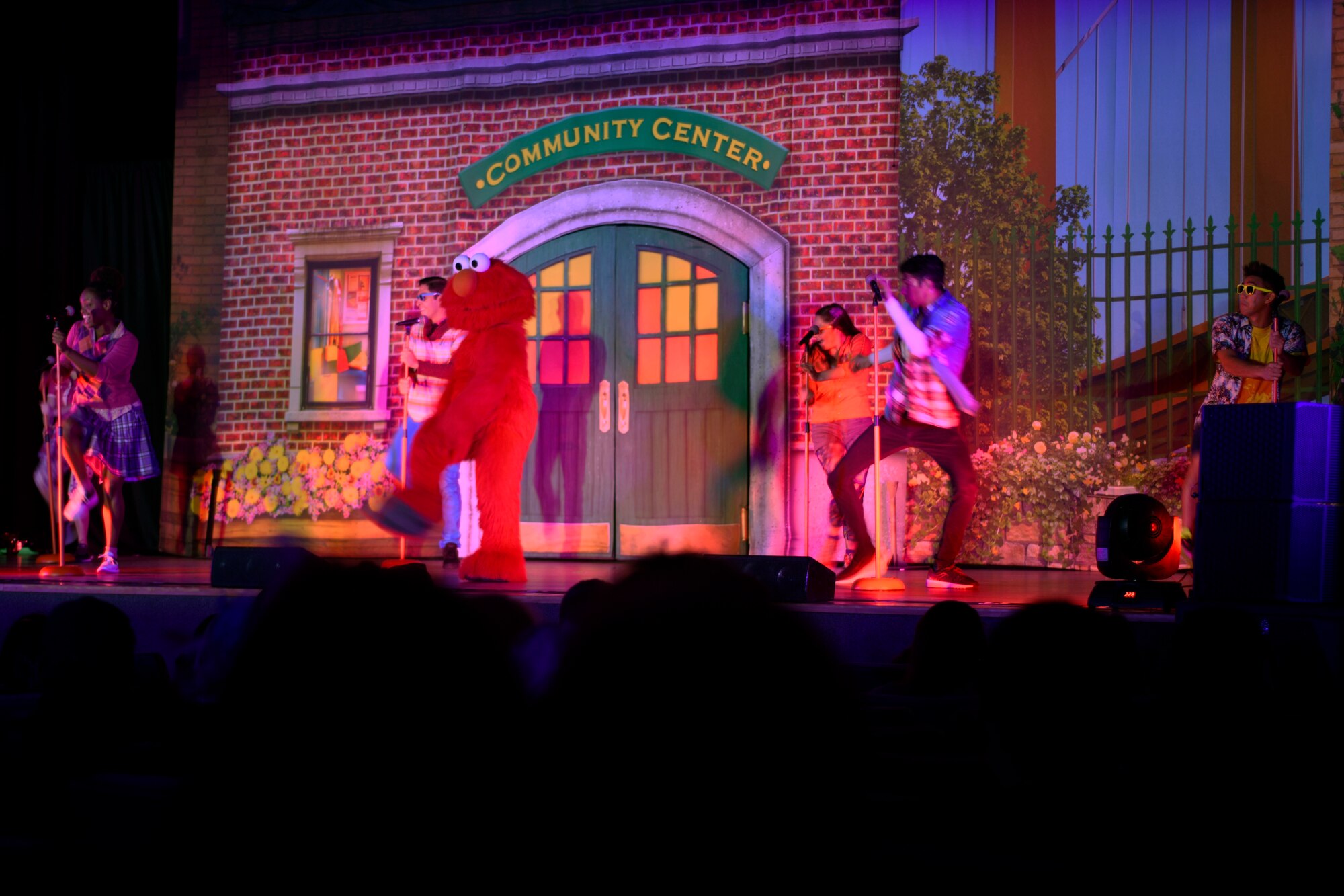 Elmo leads Malmstrom children in a dance during a Sesame Street Live performance at the base theater March 23, 2019, on Malmstrom Air Force Base, Mont.