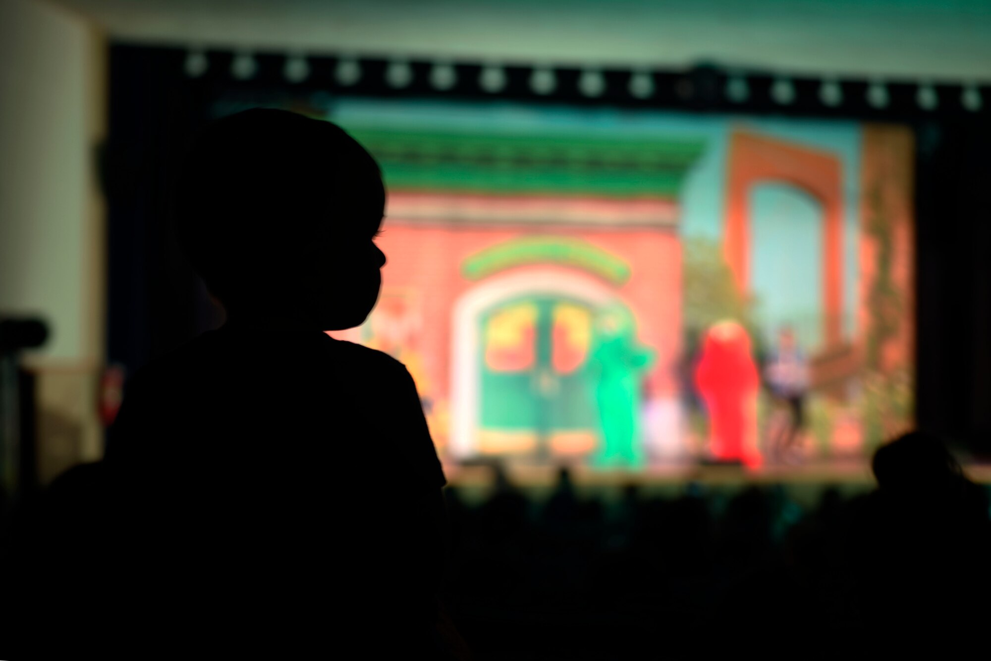 A child watches a Sesame Street Live performance at the base theater March 23, 2019, on Malmstrom Air Force Base, Mont.