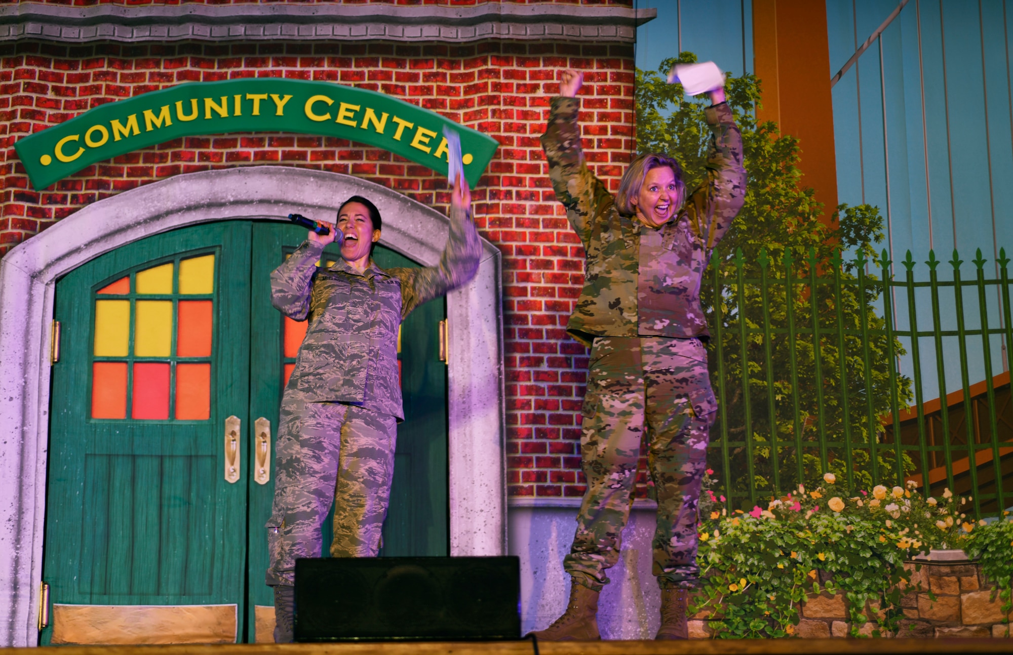 Col. Jennifer Reeves, 341st Missile Wing commander, and Chief Master Sgt. Eryn McElroy, 341st MW command chief, welcome a Sesame Street Live performance at the base theater March 23, 2019, on Malmstrom Air Force Base, Mont.