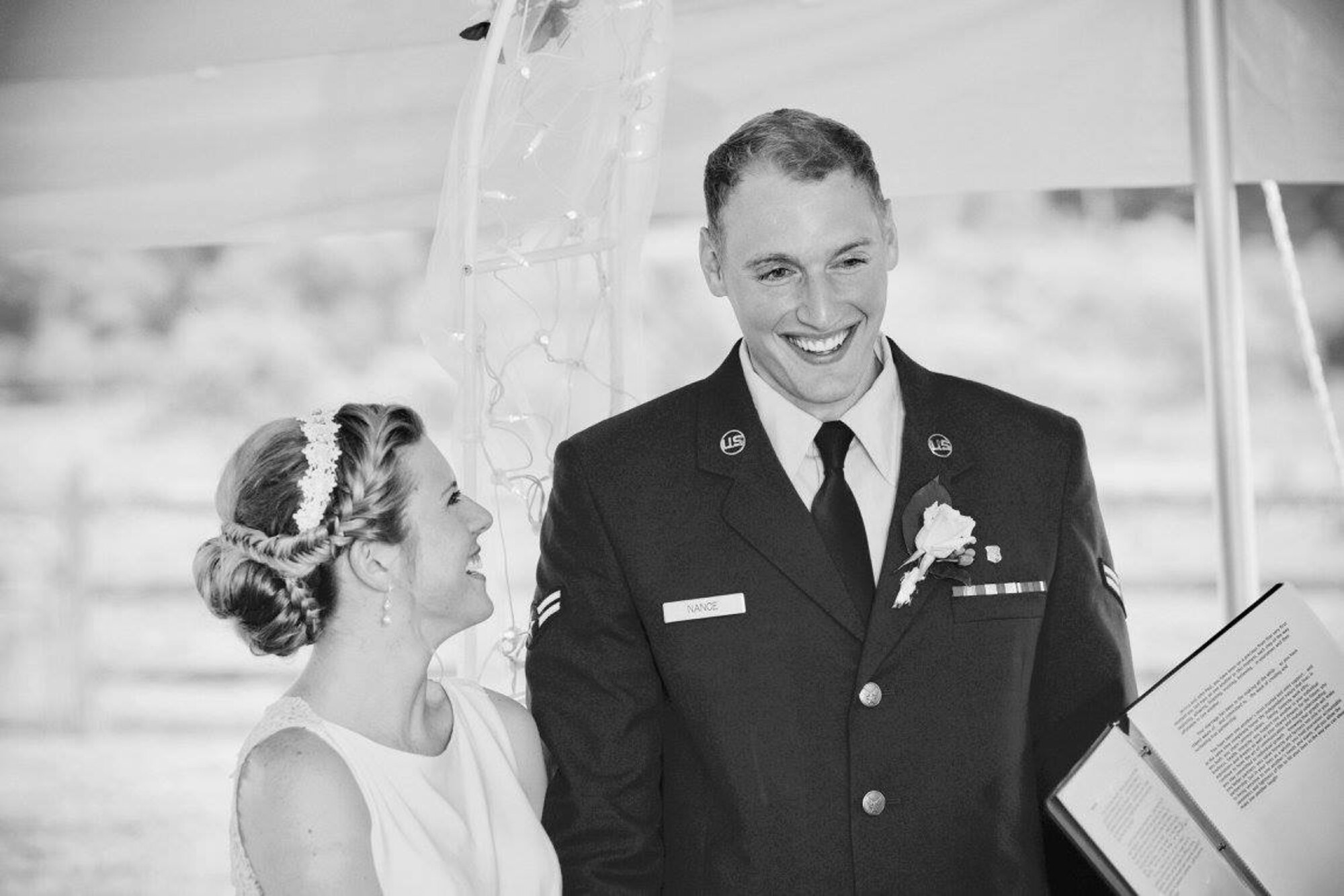 Then-Jessica Kerwin and then-Airman 1st Class John-Paul Nance recite their wedding vows, June 19, 2015, in Mansfield, Pa. Now that Staff Sgt. John Paul Nance has achieved his goals of graduating with a masters degree and commissioning as an officer, he said his new goal is to support his wife even more than she has supported him. (Courtesy photo)