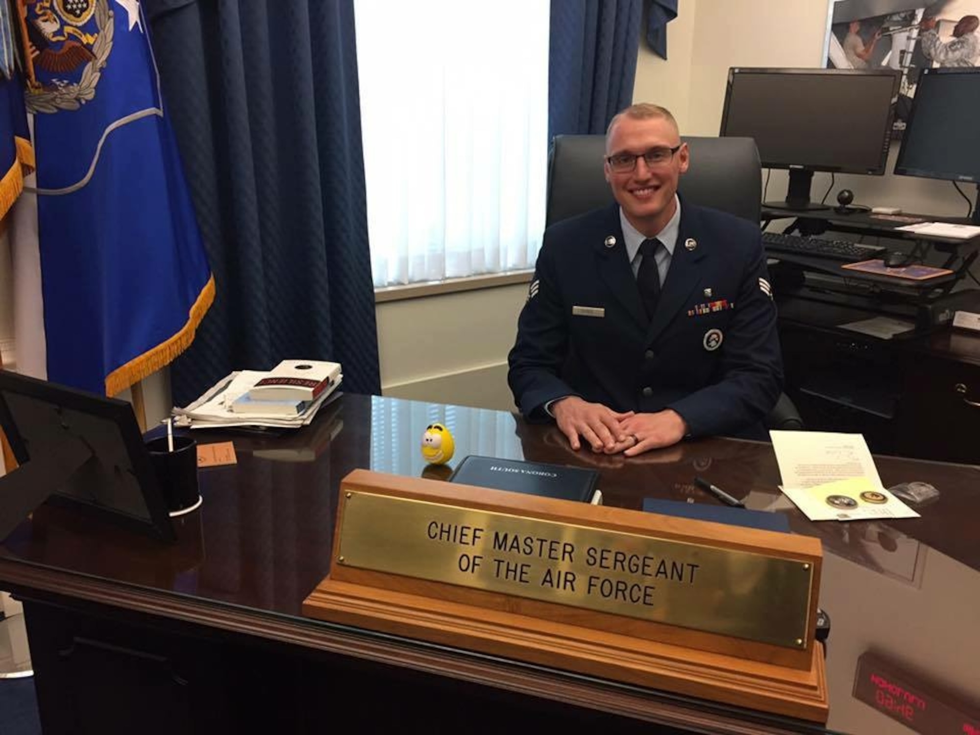 Then-Senior Airman John-Paul Nance poses for a photo at the desk of the Chief Master Sergeant of the Air Force in 2017, at the Pentagon. Nance has achieved many milestones in his enlisted Air Force career, including Senior Airman Below the Zone, Airman Leadership School's Distinguished Graduate Award, and being selected to brief the Secretary of the Air Force on the mission of the 49th Wing. (Courtesy photo)