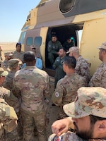 Special Troops Battalion medics, 300th Sustainment Brigade, along with Kuwaiti and Qatari Forces receive a briefing during Desert Leopard Medical Training at Task Force Sabah Aid Station, Kuwait, March 3, 2019. (U.S. Army Reserve photo by Spc. Samantha Moore)