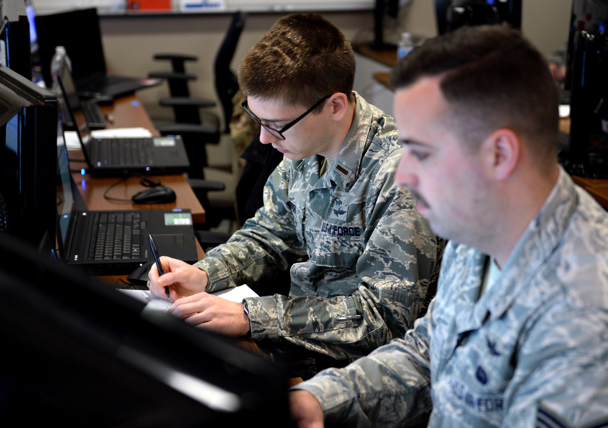 Members of the 833rd Cyberspace Operations Squadron participate in the monthly 567th Cyberspace Operations Group “hunt exercise” at Joint Base San Antonio-Lackland, Texas, March 21, 2019. The three-day exercise afforded teams from the 90th, 92nd, 833rd and 834th COSs, as well as the Air Force Office of Special Investigations, the opportunity to defend against an enemy within a virtual training network. (U.S. Air Force photo by Tech. Sgt. R.J. Biermann)