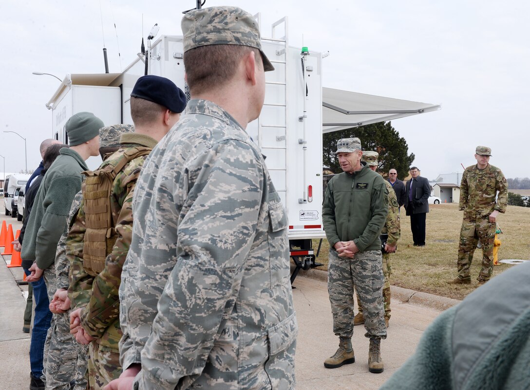 U.S. Air Force Gen. Mike Holmes, commander of Air Combat Command, thanks a few of the many men and women who worked to fortify the base before the flood waters hit and those who are supporting its recovery efforts during his visit to Offutt Air Force Base, Nebraska, on March 25, 2019. Offutt is the second ACC installation to sustain damage in the last year due to a natural disaster. In October, Tyndall Air Force Base, Florida, was damaged by Hurricane Michael. (Photo by Charles Haymond)