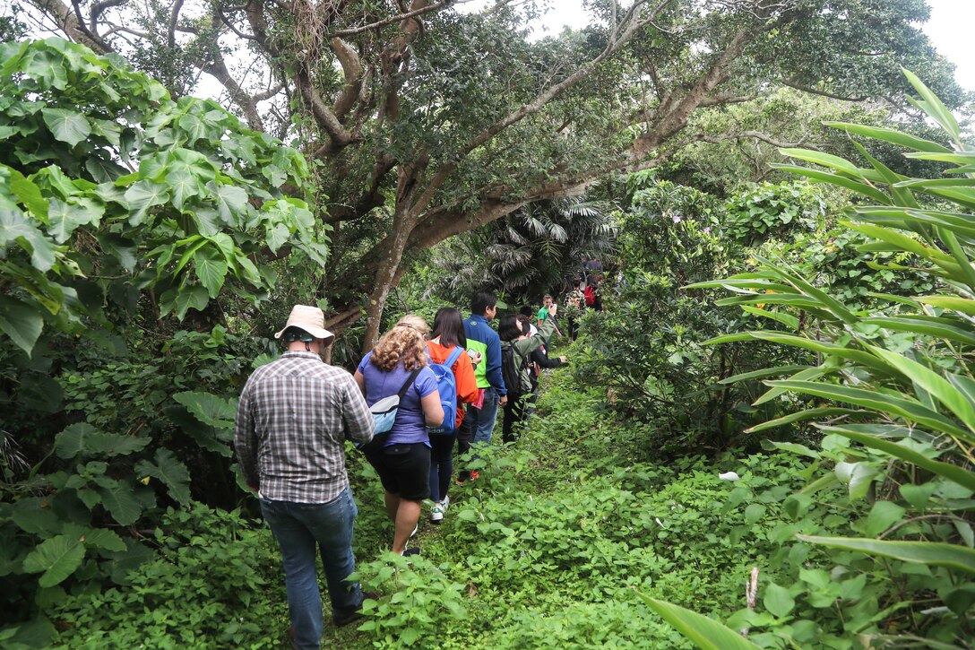Students from Camp Lester Middle School interact with students from Chatan Junior High School at Chatan Castle on Camp Smedley D. Butler, Okinawa, Japan, March 21, 2019. The students were participating in a culture exchange, held to promote a better relationship with the local community. (U.S. Marine Corps photo by Lance Cpl. Savannah Mesimer)